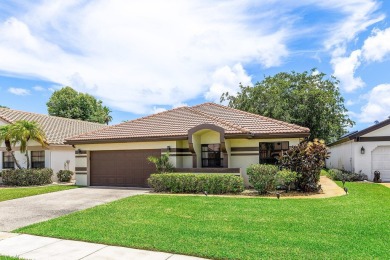 Located in the prestigious Boca Woods Country Club, this updated on Boca Woods Country Club in Florida - for sale on GolfHomes.com, golf home, golf lot