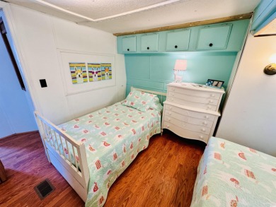 ADORABLE AND VERY SPACIOUS 3 BED/2 BATH BEACH BUNGALOW LOCATED on Prestwick Country Club in South Carolina - for sale on GolfHomes.com, golf home, golf lot