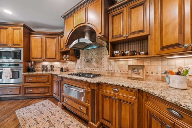 WELCOME TO THIS STUNNING CRAFTSMAN-STYLE HOME LOCATED IN ONE OF on Harbor Club Golf and Country Club in Georgia - for sale on GolfHomes.com, golf home, golf lot