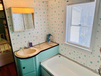 ADORABLE AND VERY SPACIOUS 3 BED/2 BATH BEACH BUNGALOW LOCATED on Prestwick Country Club in South Carolina - for sale on GolfHomes.com, golf home, golf lot