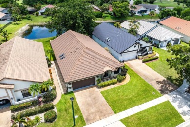 Located in the prestigious Boca Woods Country Club, this updated on Boca Woods Country Club in Florida - for sale on GolfHomes.com, golf home, golf lot