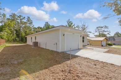 Welcome to this beautifully designed 2025-built home in the on Williston Highlands Golf and Country Club in Florida - for sale on GolfHomes.com, golf home, golf lot