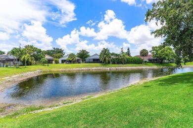 Located in the prestigious Boca Woods Country Club, this updated on Boca Woods Country Club in Florida - for sale on GolfHomes.com, golf home, golf lot
