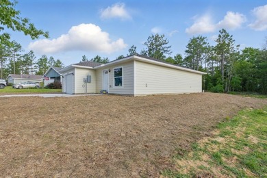 Welcome to this beautifully designed 2025-built home in the on Williston Highlands Golf and Country Club in Florida - for sale on GolfHomes.com, golf home, golf lot