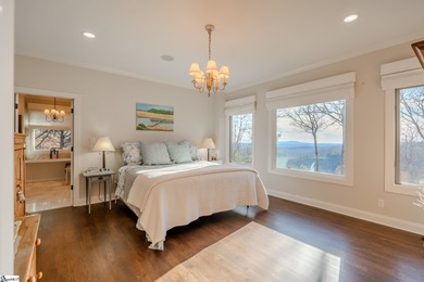 From the first step inside, this 3,334 SF home reveals itself as on The Cliffs at Glassy Golf and Country Club in South Carolina - for sale on GolfHomes.com, golf home, golf lot