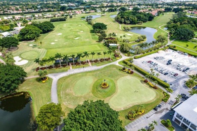 Located in the prestigious Boca Woods Country Club, this updated on Boca Woods Country Club in Florida - for sale on GolfHomes.com, golf home, golf lot