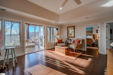 From the first step inside, this 3,334 SF home reveals itself as on The Cliffs at Glassy Golf and Country Club in South Carolina - for sale on GolfHomes.com, golf home, golf lot