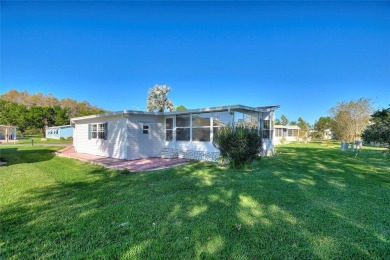 Discover Your Dream Home on Golden Pond: A Perfect Blend of on Polo Park Golf Course in Florida - for sale on GolfHomes.com, golf home, golf lot