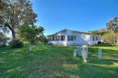 Discover Your Dream Home on Golden Pond: A Perfect Blend of on Polo Park Golf Course in Florida - for sale on GolfHomes.com, golf home, golf lot