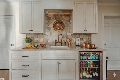 From the first step inside, this 3,334 SF home reveals itself as on The Cliffs at Glassy Golf and Country Club in South Carolina - for sale on GolfHomes.com, golf home, golf lot