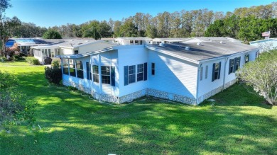 Discover Your Dream Home on Golden Pond: A Perfect Blend of on Polo Park Golf Course in Florida - for sale on GolfHomes.com, golf home, golf lot