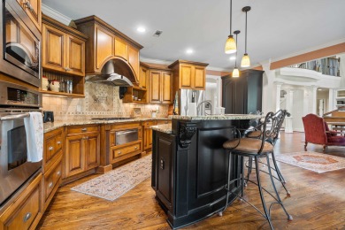 WELCOME TO THIS STUNNING CRAFTSMAN-STYLE HOME LOCATED IN ONE OF on Harbor Club Golf and Country Club in Georgia - for sale on GolfHomes.com, golf home, golf lot