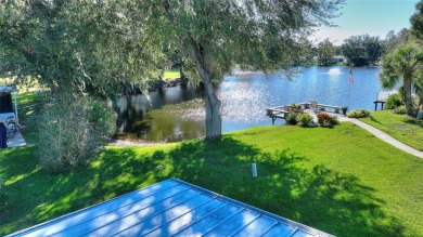 Discover Your Dream Home on Golden Pond: A Perfect Blend of on Polo Park Golf Course in Florida - for sale on GolfHomes.com, golf home, golf lot