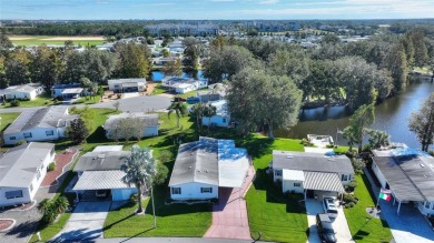 Discover Your Dream Home on Golden Pond: A Perfect Blend of on Polo Park Golf Course in Florida - for sale on GolfHomes.com, golf home, golf lot