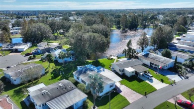 Discover Your Dream Home on Golden Pond: A Perfect Blend of on Polo Park Golf Course in Florida - for sale on GolfHomes.com, golf home, golf lot