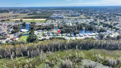 Discover Your Dream Home on Golden Pond: A Perfect Blend of on Polo Park Golf Course in Florida - for sale on GolfHomes.com, golf home, golf lot