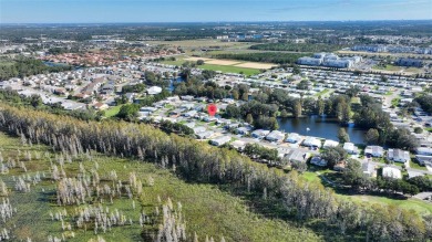 Discover Your Dream Home on Golden Pond: A Perfect Blend of on Polo Park Golf Course in Florida - for sale on GolfHomes.com, golf home, golf lot