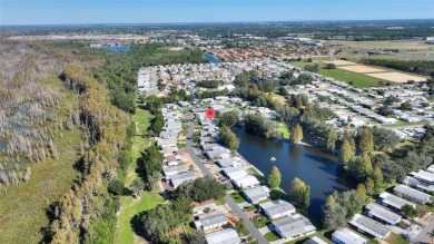 Discover Your Dream Home on Golden Pond: A Perfect Blend of on Polo Park Golf Course in Florida - for sale on GolfHomes.com, golf home, golf lot