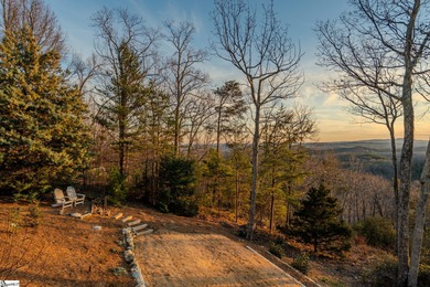 From the first step inside, this 3,334 SF home reveals itself as on The Cliffs at Glassy Golf and Country Club in South Carolina - for sale on GolfHomes.com, golf home, golf lot