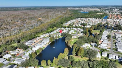 Discover Your Dream Home on Golden Pond: A Perfect Blend of on Polo Park Golf Course in Florida - for sale on GolfHomes.com, golf home, golf lot