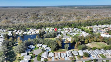 Discover Your Dream Home on Golden Pond: A Perfect Blend of on Polo Park Golf Course in Florida - for sale on GolfHomes.com, golf home, golf lot