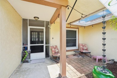 Tucked away in Windmill Pointe of Tarpon Lake, this tastefully on Lansbrook Golf Club in Florida - for sale on GolfHomes.com, golf home, golf lot