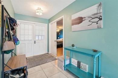 Tucked away in Windmill Pointe of Tarpon Lake, this tastefully on Lansbrook Golf Club in Florida - for sale on GolfHomes.com, golf home, golf lot
