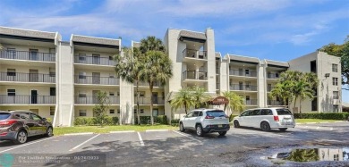 Beautiful condo in Pine Island Ridge's Poinciana community with on Pine Island Ridge Country Club in Florida - for sale on GolfHomes.com, golf home, golf lot