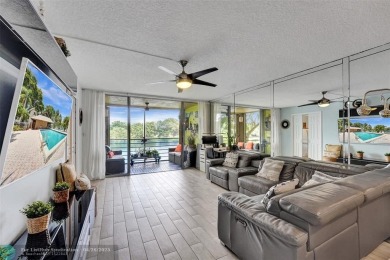 Beautiful condo in Pine Island Ridge's Poinciana community with on Pine Island Ridge Country Club in Florida - for sale on GolfHomes.com, golf home, golf lot