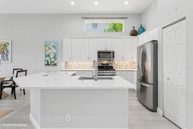 THIS PRINCETON MODIFIED MODEL OFFERS 3BR PLUS DEN, 2.1 BA & on Ibis Golf and Country Club in Florida - for sale on GolfHomes.com, golf home, golf lot