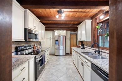 You will fall in love when you step inside and see the main on The Highlands Course at Lake Arrowhead in Georgia - for sale on GolfHomes.com, golf home, golf lot