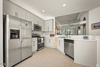 This beautifully updated and professionally styled single-family on LPGA International Golf Course in Florida - for sale on GolfHomes.com, golf home, golf lot