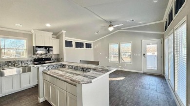 Discover this charming 1-bedroom, 1-bath Country Cottage by on Links At Lands End in Texas - for sale on GolfHomes.com, golf home, golf lot
