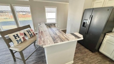 Discover this charming 1-bedroom, 1-bath Country Cottage by on Links At Lands End in Texas - for sale on GolfHomes.com, golf home, golf lot