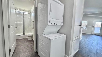 Discover this charming 1-bedroom, 1-bath Country Cottage by on Links At Lands End in Texas - for sale on GolfHomes.com, golf home, golf lot