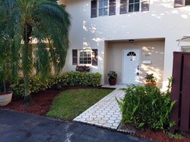 This spacious and beautiful end unit townhome has recently been on Palm-Aire Country Club and Resort - Palms in Florida - for sale on GolfHomes.com, golf home, golf lot