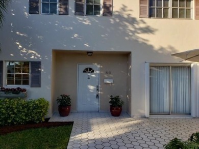 This spacious and beautiful end unit townhome has recently been on Palm-Aire Country Club and Resort - Palms in Florida - for sale on GolfHomes.com, golf home, golf lot