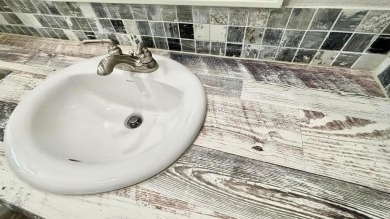 Discover this charming 1-bedroom, 1-bath Country Cottage by on Links At Lands End in Texas - for sale on GolfHomes.com, golf home, golf lot