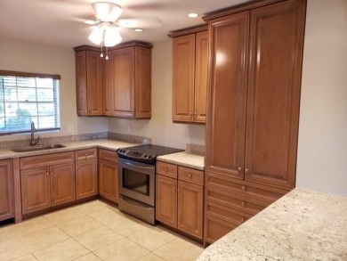 This spacious and beautiful end unit townhome has recently been on Palm-Aire Country Club and Resort - Palms in Florida - for sale on GolfHomes.com, golf home, golf lot