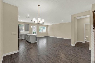 Welcome HOME to 1212 Payne Stewart Dr in the highly sought after on ChampionsGate Golf Resort in Florida - for sale on GolfHomes.com, golf home, golf lot
