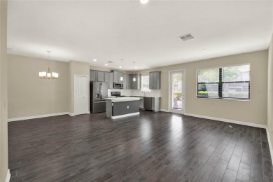 Welcome HOME to 1212 Payne Stewart Dr in the highly sought after on ChampionsGate Golf Resort in Florida - for sale on GolfHomes.com, golf home, golf lot