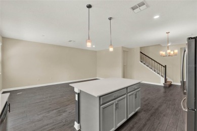 Welcome HOME to 1212 Payne Stewart Dr in the highly sought after on ChampionsGate Golf Resort in Florida - for sale on GolfHomes.com, golf home, golf lot