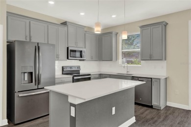 Welcome HOME to 1212 Payne Stewart Dr in the highly sought after on ChampionsGate Golf Resort in Florida - for sale on GolfHomes.com, golf home, golf lot