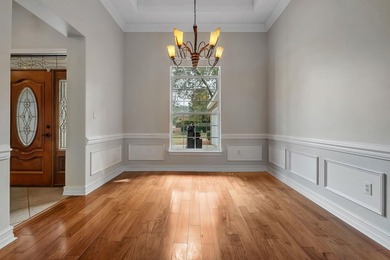 All-brick residential home located at 2250 Cobb Drive within the on Golden Eagle Country Club in Florida - for sale on GolfHomes.com, golf home, golf lot