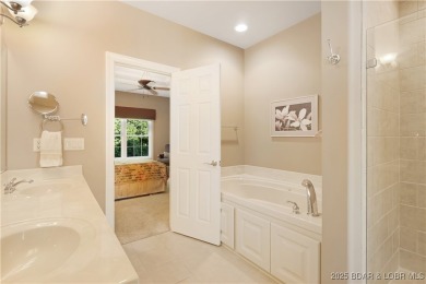Welcome to luxury living in one of the most highly sought-after on The Club At Porto Cima in Missouri - for sale on GolfHomes.com, golf home, golf lot