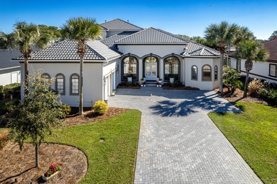 Tucked away within the highly sought-after-gated community of on Emerald Bay Golf Club in Florida - for sale on GolfHomes.com, golf home, golf lot