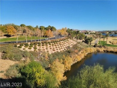 RESORT LIVING STYLE. Gorgeous lake, mountains, and golf course on Reflection Bay Golf Club in Nevada - for sale on GolfHomes.com, golf home, golf lot