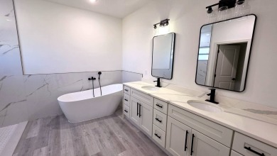 This home has the perfect blend of luxury and comfort, open on Rotonda Golf and Country Club - Long Marsh  in Florida - for sale on GolfHomes.com, golf home, golf lot