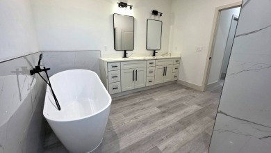 This home has the perfect blend of luxury and comfort, open on Rotonda Golf and Country Club - Long Marsh  in Florida - for sale on GolfHomes.com, golf home, golf lot