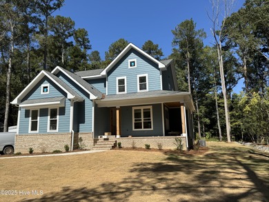 Welcome to your brand new construction dream home built by local on Woodlake Country Club in North Carolina - for sale on GolfHomes.com, golf home, golf lot